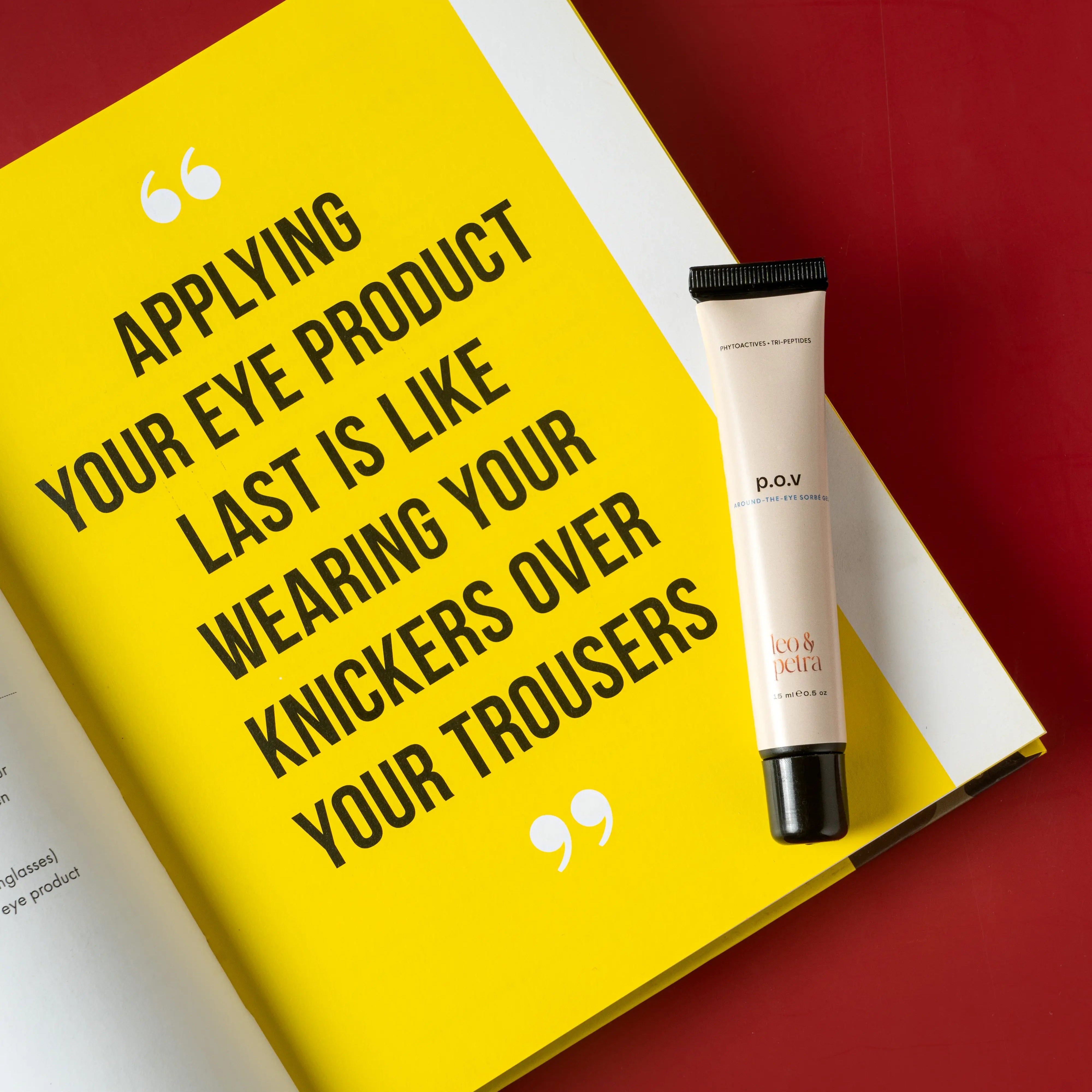 Skincare product with a humorous quote on a yellow background