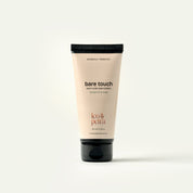 Tube of 'bare touch' hand cream on a white background